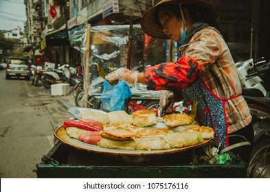 Hanoi, Hanoi/ Vietnam - 12 31 2017: a food stall selling fried Chung cake on the street in Hanoi, Vietnam.