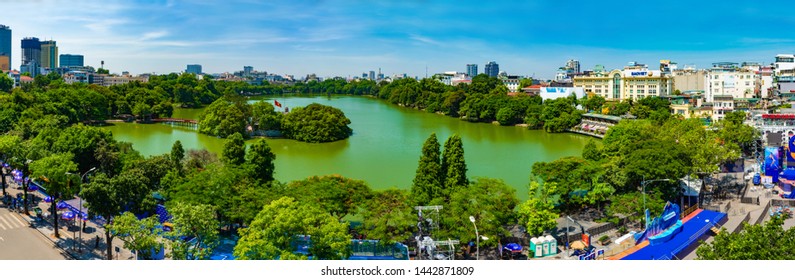 Hanoi, Vietnam - 22nd June 2019: Aerial view of Hoan Kiem Lake with its surrounding buildings, in Hanoi Old Quarter, Vietnam; at a bright sunny morning.
