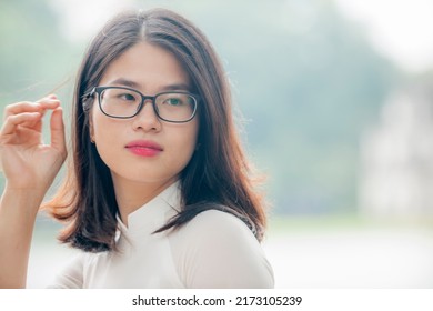 Hanoi, Vietnam -  June 30, 2022: Hanoi Girl In Traditional Ao Dai