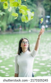 Hanoi, Vietnam -  June 30, 2022: Hanoi Girl In Traditional Ao Dai