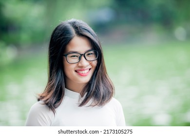 Hanoi, Vietnam -  June 30, 2022: Hanoi Girl In Traditional Ao Dai