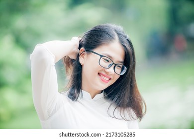 Hanoi, Vietnam -  June 30, 2022: Hanoi Girl In Traditional Ao Dai