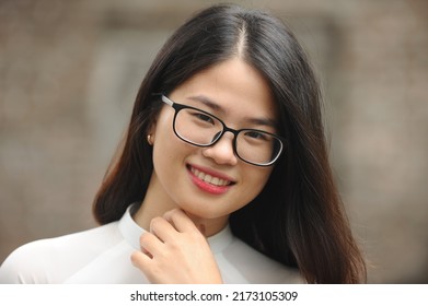 Hanoi, Vietnam -  June 30, 2022: Hanoi Girl In Traditional Ao Dai