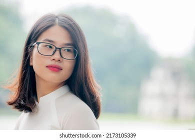 Hanoi, Vietnam -  June 30, 2022: Hanoi Girl In Traditional Ao Dai