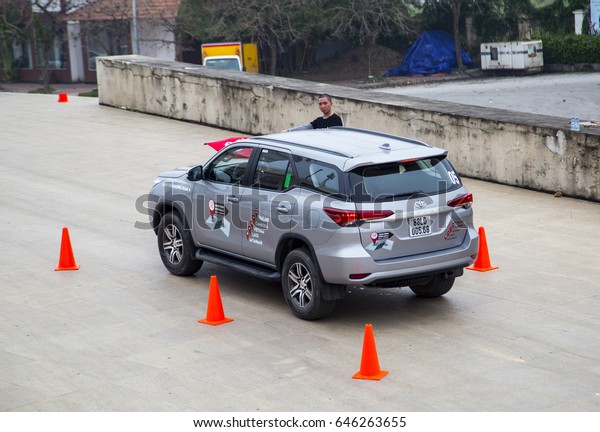 Hanoi, Vietnam - Mar 12, 2017: Toyota\
Fortuner 2017 SUV in a test drive for ability on multi terrains in\
test drive for  public everybody in Hanoi,\
Vietnam.