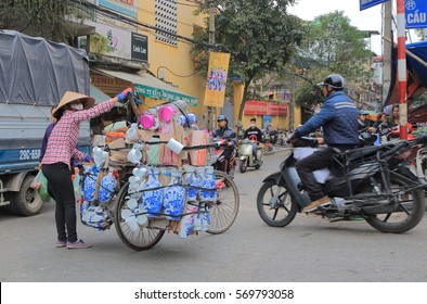 HANOI VIETNAM - NOVEMBER 24, 2016: Unidentified people visit Old Quarter district. 