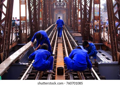 Hanoi, Vietnam - September 22 2015: Workmen On Long Biên Bridge In Hanoi