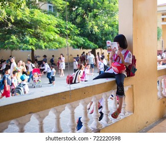 Hanoi, Vietnam - September 24, 2015: The Girl Is Reading A Story At The School