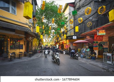 HANOI/VIETNAM - December 2, 2019: Beautiful tourist street with decorations in the Old Quarter of Hanoi