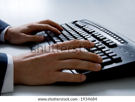 hans on a computer keyboard
