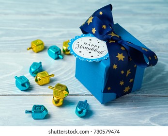 Hanukkah Celebration With Gift Box And Spinning Top