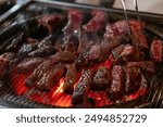 Hanwoo Beef, Korean Style Meat on the Grill. BBQ rare meat with soft focus