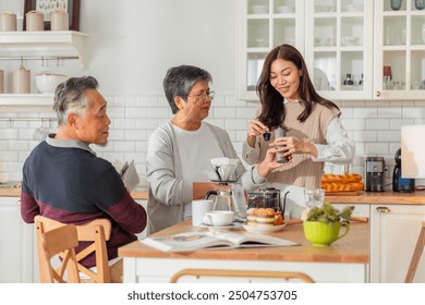 happiness asian family bonding family reunion fresh coffee bean drip process together in kitchen Drip coffee Mature woman pouring coffee cup for senior woman sitting at dining table lifestyle family - Powered by Shutterstock