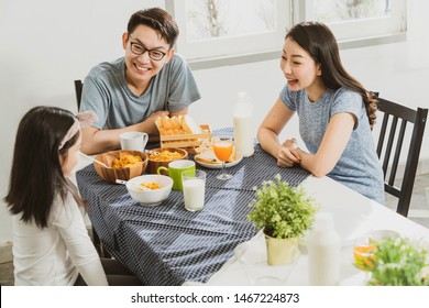 Happiness Asian Family Dad Mom And Daughter Enjoy Breakfast Together On Dining Table Wonderful Moment Family Concept