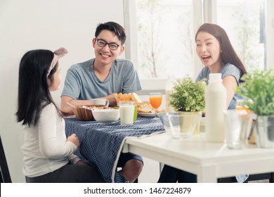 Happiness Asian Family Dad Mom And Daughter Enjoy Breakfast Together On Dining Table Wonderful Moment Family Concept