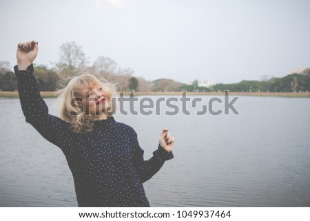 Happiness concept, Close up shot of young woman have a happy time