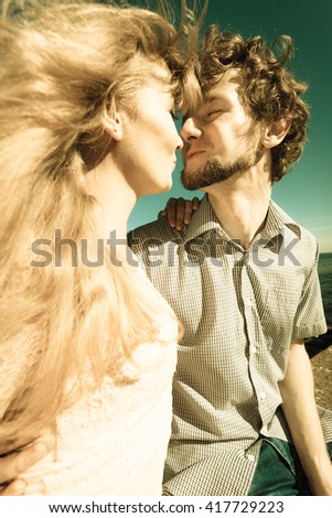 Similar – Young couple in love are posing face to face