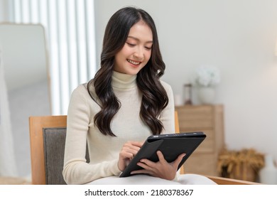 Happiness Entrepreneur Beautiful Business Asian Young Woman Wear Casual Use Computer Tablet For Shopping Online Enjoy With Social Media And Laptop At Home. Small Business Startup. Online Banking