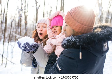 Happiness Excited People In Warm Clothing In Winter Outdoors