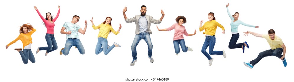 happiness  freedom  motion  diversity   people concept    international group happy smiling men   women jumping over white background