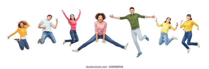 Happiness, Freedom, Motion And People Concept - Smiling Young International Friends Jumping In Air Over White Background