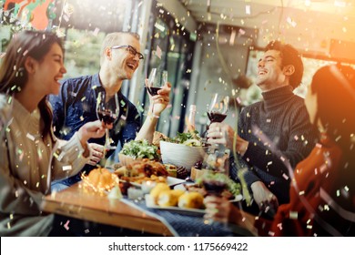 Happiness Friends Thanksgiving Christmas Eve Celebrate Dinner Party With Food Wine And Laugh Together With Joyful Moment