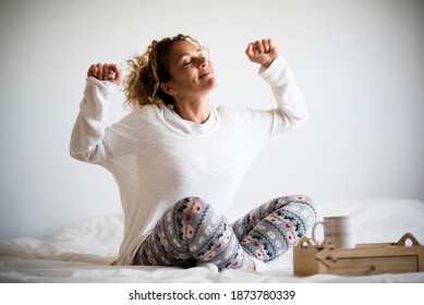 Happiness And Good Life Concept With Happy Adult Young Woman Wake Up And Enjoy The Morning Light - Home Or Hotel Room - People Waking Up And Live Nice Lifestyle