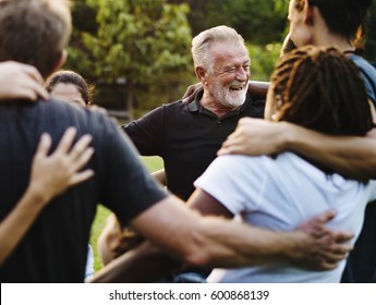 Happiness group of people huddle and smiling together - Shutterstock ID 600868139
