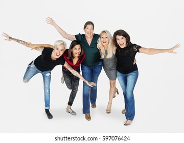 Happiness Group Of Women Arms Stretched And Huddle Playful