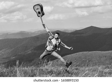 Happiness. Hipster Fashion. Western Camping And Hiking. Happy And Free. Cowboy Man With Bare Muscular Torso. Acoustic Guitar Player. Country Music Song. Sexy Man With Guitar In Checkered Shirt.