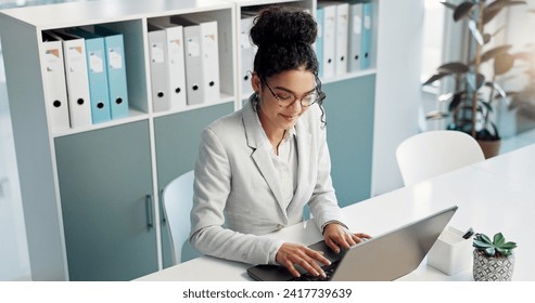 Happiness, laptop and typing professional woman, advocate or government attorney reading feedback review. Corporate research, law firm and business lawyer working on legal project development plan
