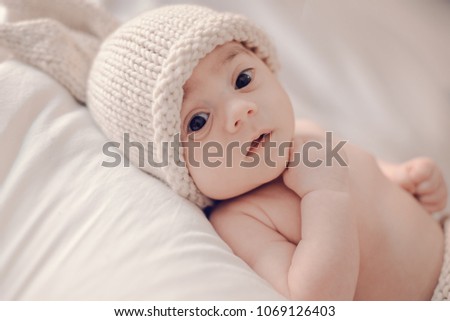 Similar – Baby girl wrapped in a blanket