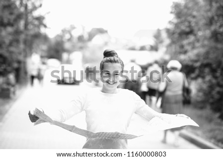 Similar – Image, Stock Photo Smiling brunette girl holding surfboard over her head
