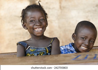 Happiness Symbol: Couple Of African Children Laughing At School 