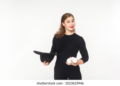 Happiness Woman Holding Juggler Balls And Hat. Studio Shot, Isolated On White Background