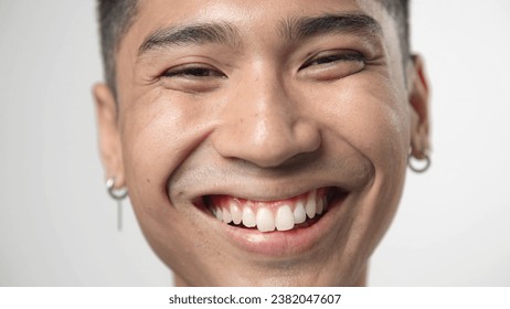 Happy 20s japanese person look camera. 30 years old chinese guy smile. Nice asian young adult man face portrait close up. One cute korean male teen. Asia china model life. Fun japan youth. Korea joy z - Powered by Shutterstock