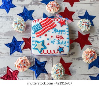 Happy 4th Of July Cake With Cupcakes Seen From Above