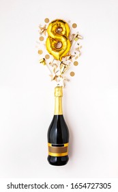 Happy 8th Anniversary Party. Champagne Bottle With Gold Number Balloon.