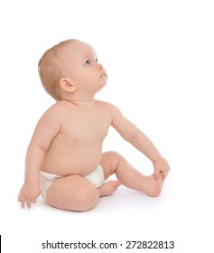 Happy 9 Month Infant Child Baby Toddler Sitting Looking Up Isolated On A White Background