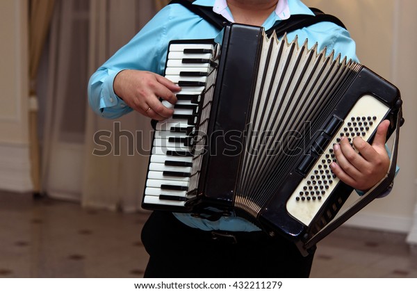 Happy Accordion Musician Playing Wedding Reception Stock Image