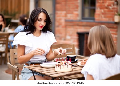 Happy Adorable Girl With Mom Celebrate With Birthday Cake In Cafe Terrace. 10 Year Old Celebrate Birthday.