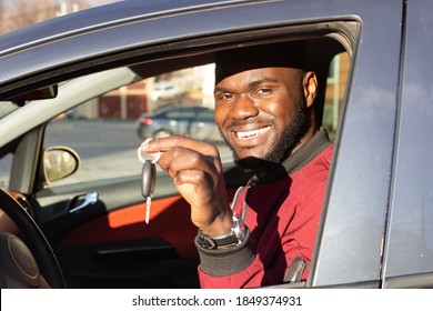 the Happy African American with car key