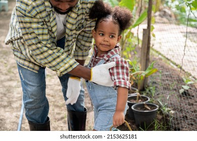 Happy African American Child Girl With Family At Farm