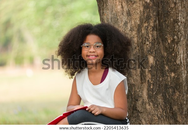 Happy African American Child Girl Wearing Stock Photo 2205413635