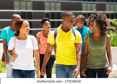 Happy African American College Students Walking Together On Campus