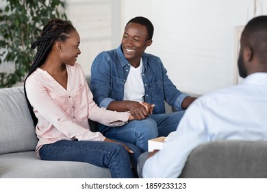 Happy African American Couple Visiting Social Worker Before Adoption, Smiling Black Spouses Sitting On Couch, Preparing Child Custody, Sitting On Consultation With Family Counselor, Free Space