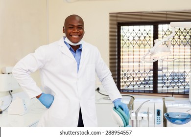 Happy African American Dentist In Office