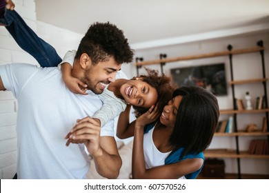 Happy African American Family Having Fun At Home.