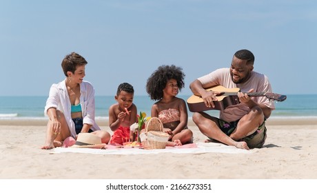 Happy African American Family Picnic On The Beach