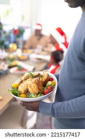 Happy African American Family Spending Time Together Having Christmas Meal. Christmas, Family Time And Celebration Concept.